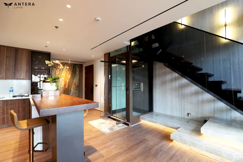 Thang máy Antera Lifts lắp đặt cạnh thang bộ trong căn Penthouse tại TP.HCM Thang máy Antera Lifts lắp đặt cạnh thang bộ trong căn Penthouse tại TP.HCM