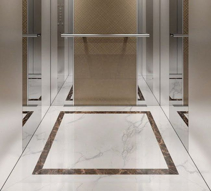 Sàn thang máy bằng đá Marble có bề mặt bóng, tạo không gian rộng rãi cho cabin